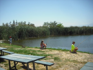 Kids enjoying the fishing pond at the Raahauge Shooting Fair last month. (RACHEL ALEXANDER) 