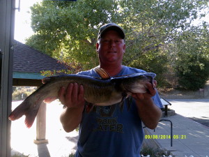 Mike Schley with a 7.7-pound catfish. (LAKE DEL VALLE) 