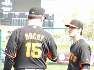 San Francisco Giants manager Bruce Bochy confers with pitcher Tim Lincecum at spring training in Scottsdale, Ariz. Bochy an fellow World Series skipper Ned Yost are both avid elk hunters. (CHRIS COCOLES) 