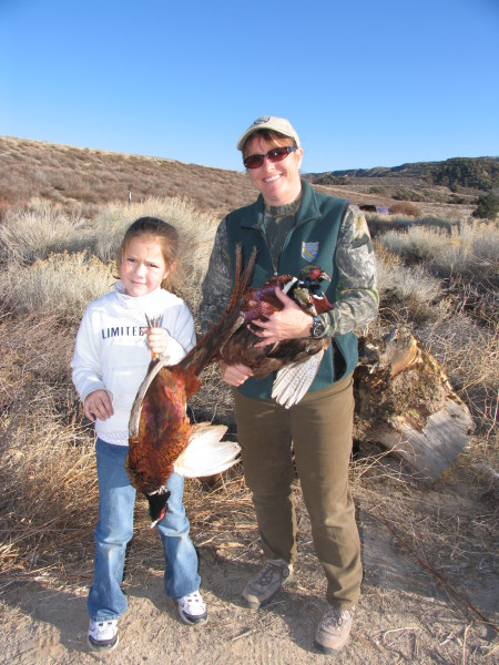 Young Alyssa Hovey (with Kim McKee) during her first pheasant hunt back in 2007. (TIM HOVEY) 