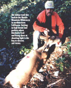 The author with a buck he shot