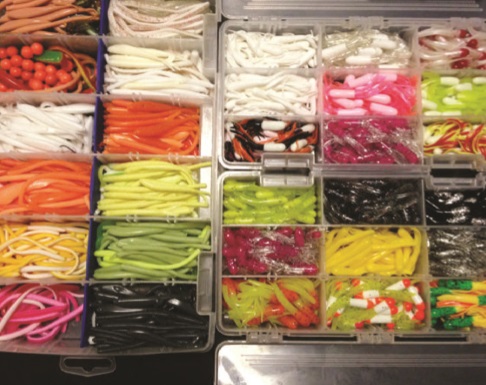 Craig Adkinson’s collection of jigs and worms will work well this time of year. A key is letting your rig sink toward the bottom and then retrieved slowly through the strike zone. (CRAIG ADKINSON)