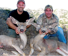 Eric Frandsen (left) and the author with two Catalina Island does. Wildlife West will trade any California deer tag for the state’s current deer season for its special island deer management tag. (TIM E. HOVEY)