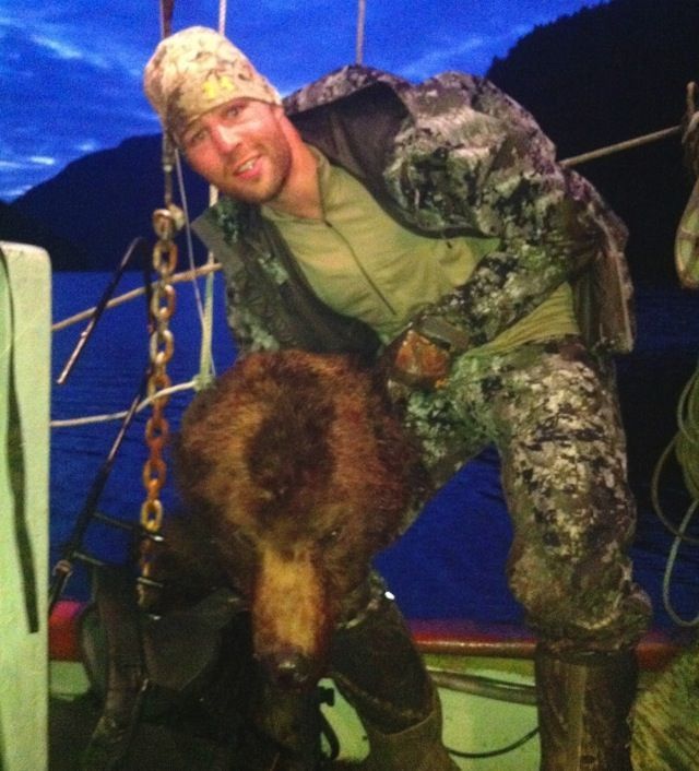Hockey player Clayton Stoner and his bear that he hunted illegally in 2013 in British Columbia. (VANCOUVER SUN)