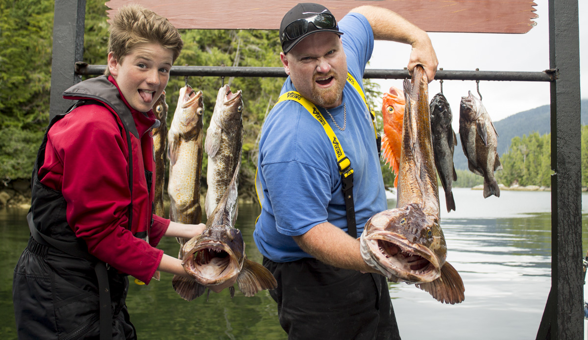 Rivers Inlet Sportsman’s Club fishing lodge owner’s son Kieran and his monster 30-pound lingcod, caught on July 25. (RIVERS INLET)